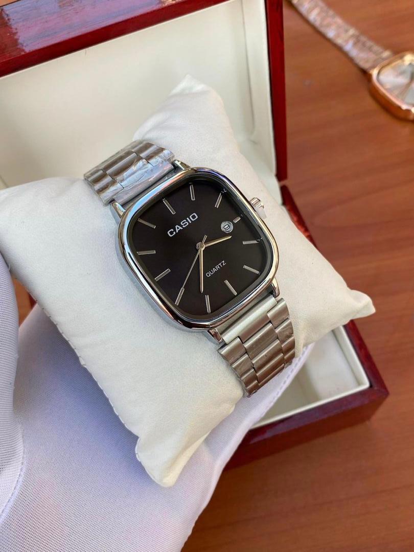 Casio - Silver with a black dial