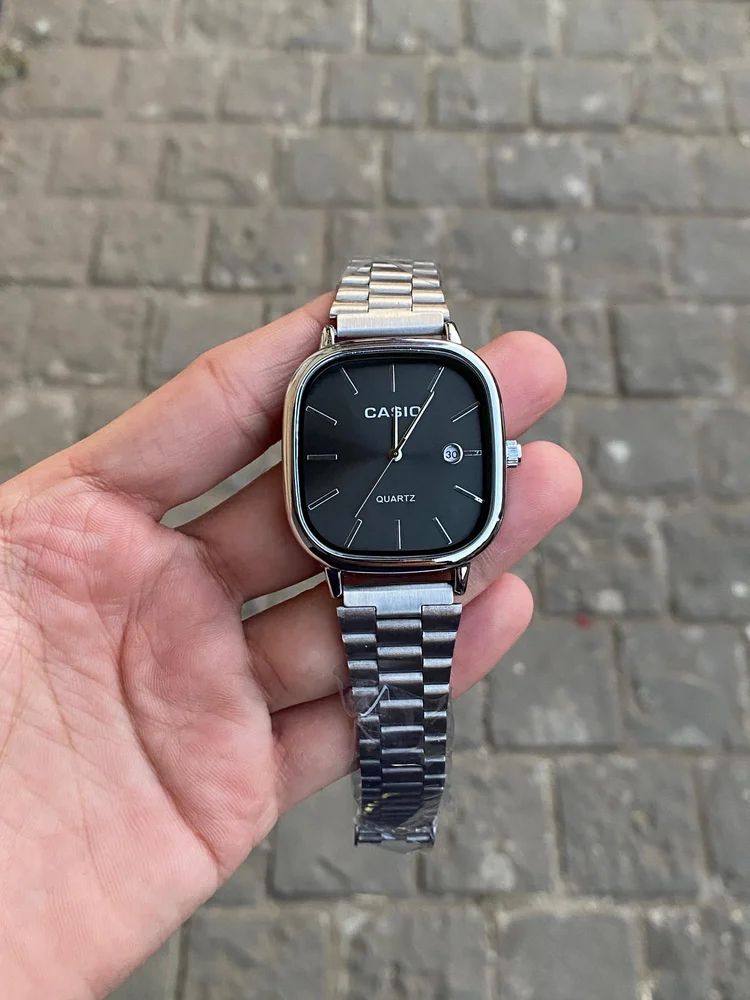Casio - Silver with a black dial